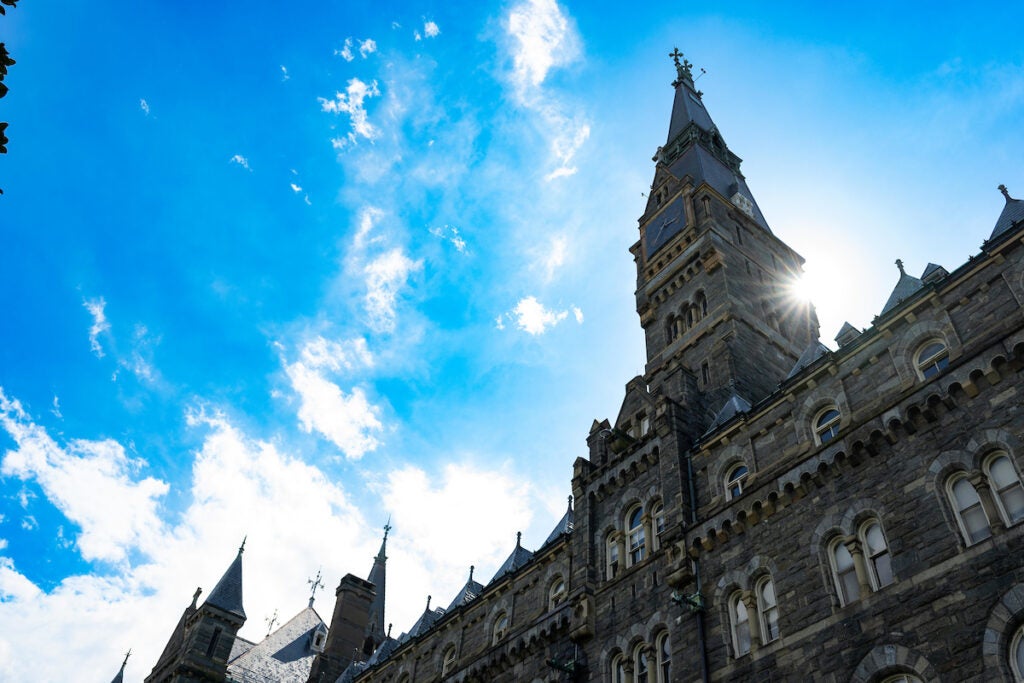 Healy Hall - looking upward to blue sky and scattered white clouds