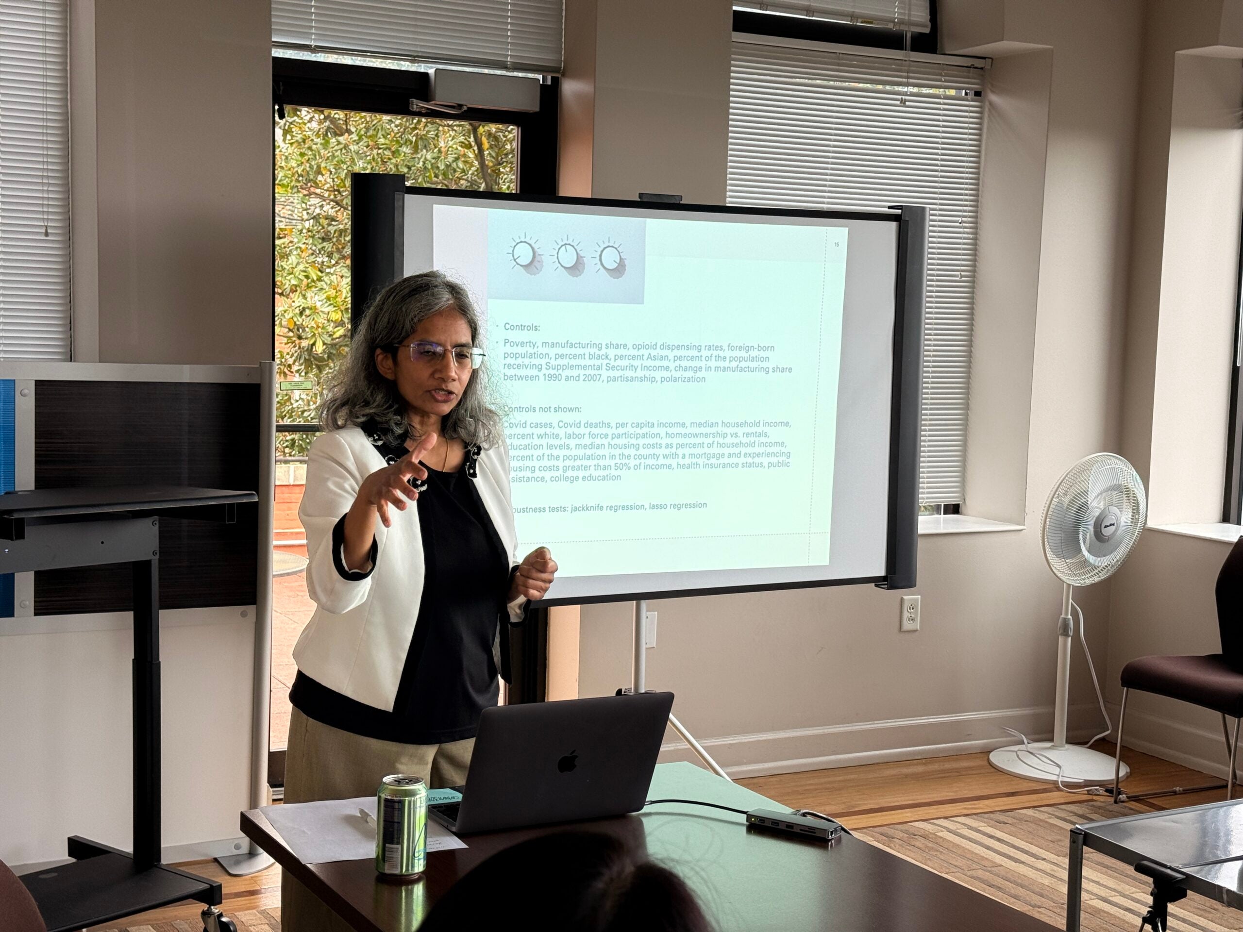 Professor giving a Colloquium lecture.