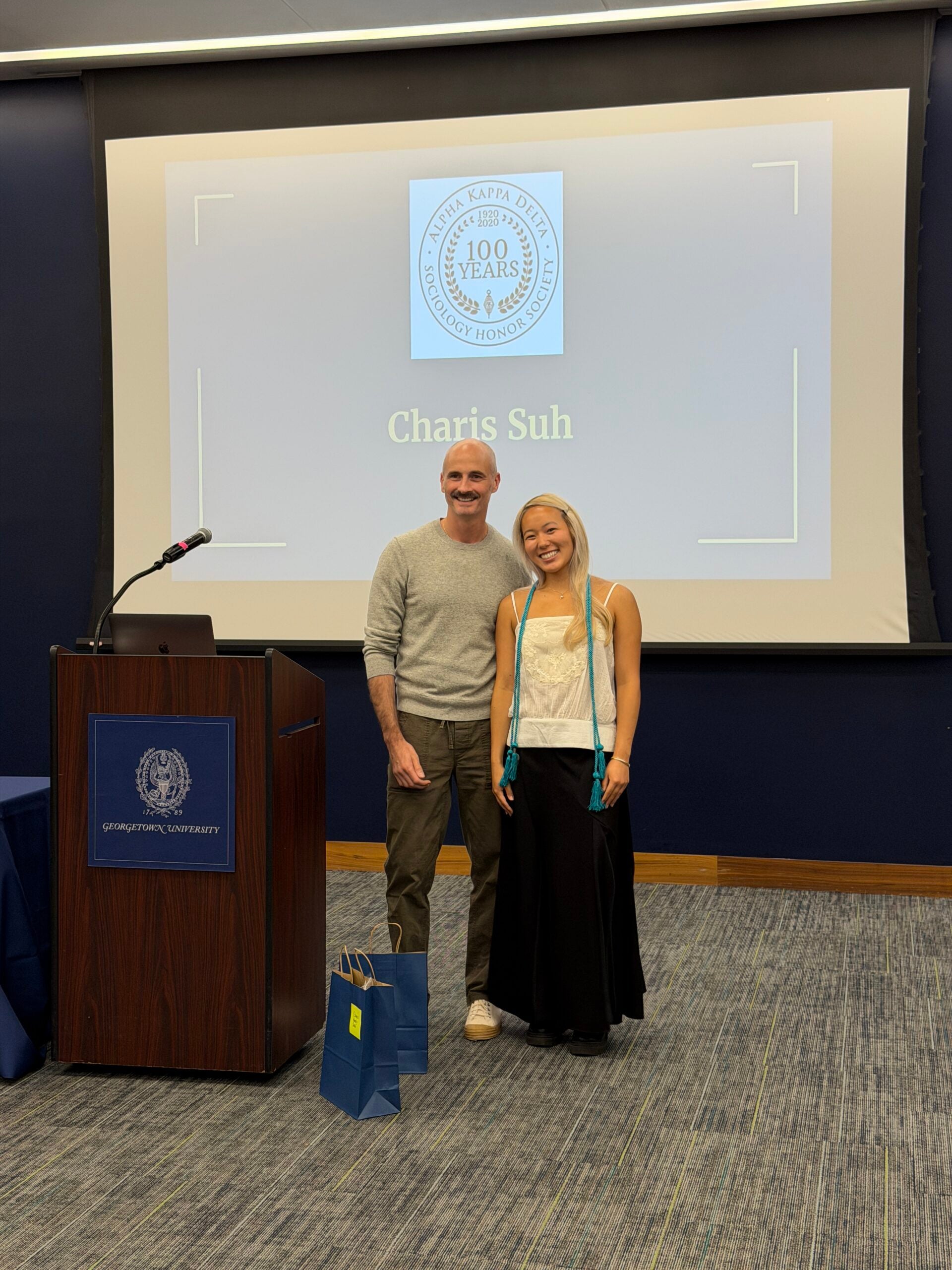 Inductee Charis Suh and Professor Brian McCabe