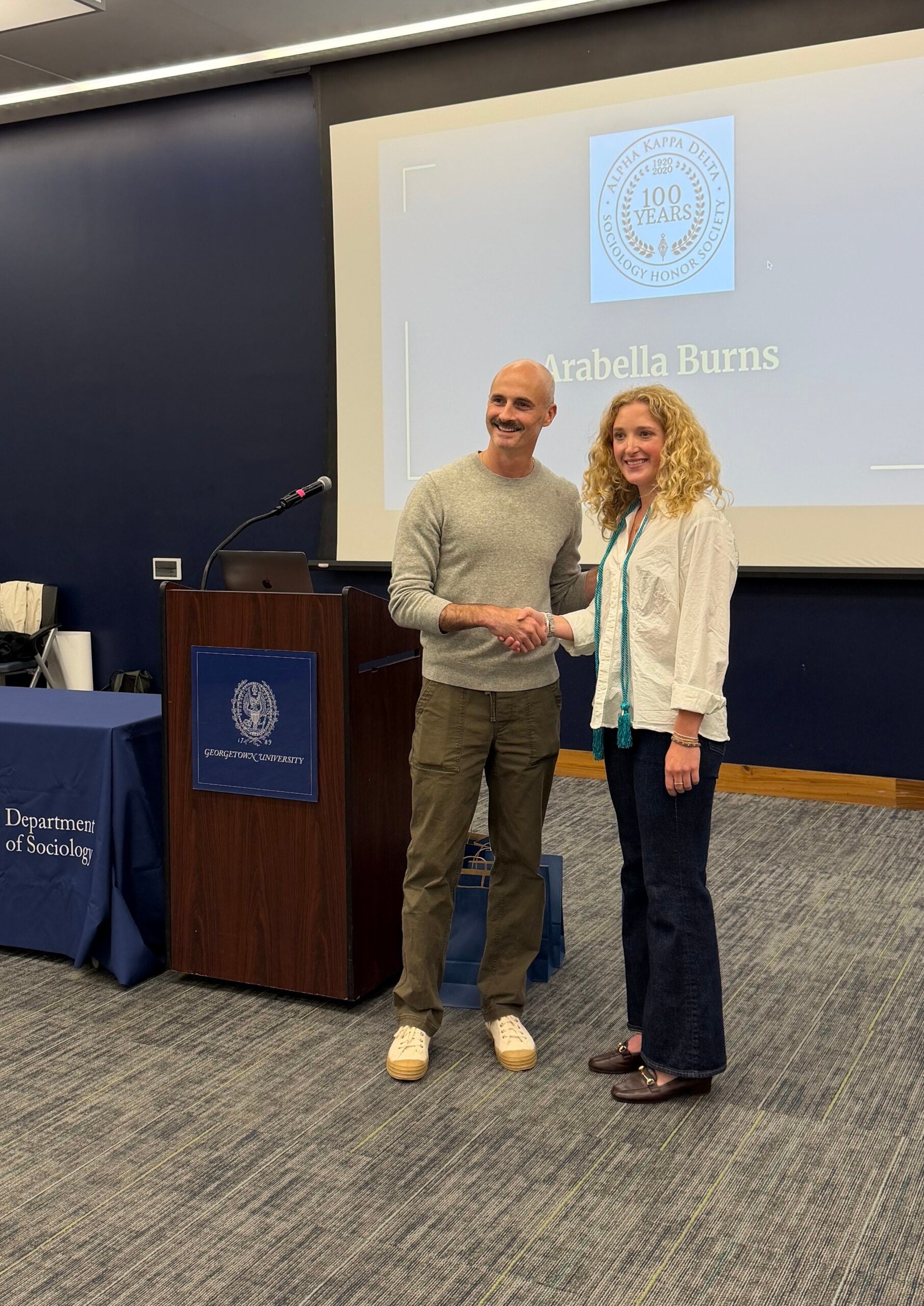 Inductee Arabella Burns and Professor Brian McCabe